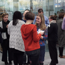 People discussing at a conference