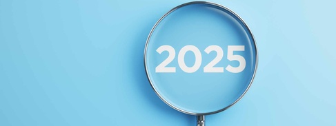 Magnifying glass showing 2025