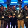 Picture of the 2025 Cambridge iGem team with their gold medal